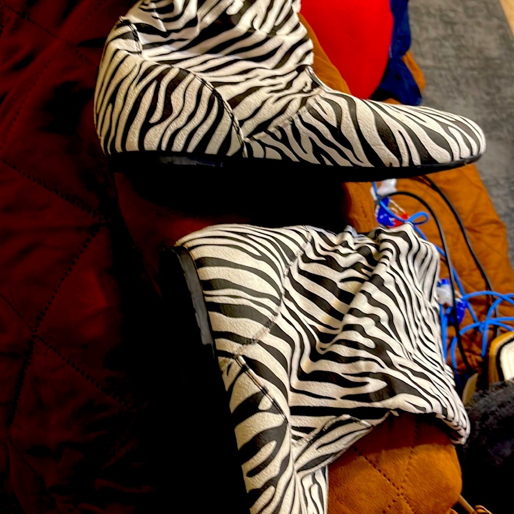 Zebra print boots never been worn
